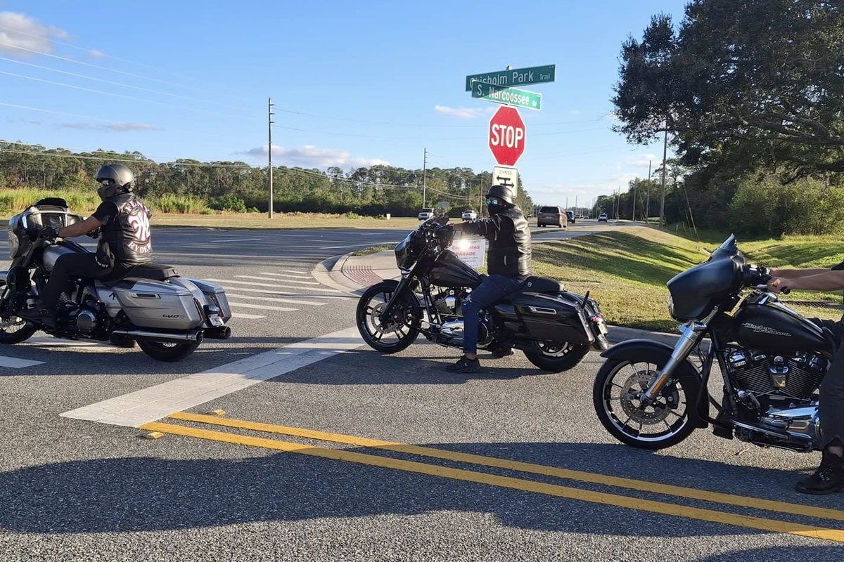 FLNY Ryderz motorcycles lined up on the road